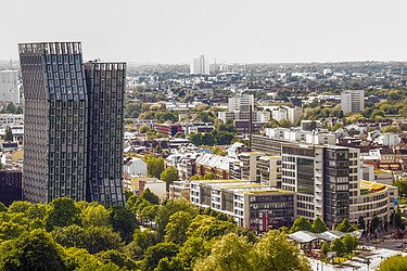 View of the Hamburg skyline with trees in the foreground