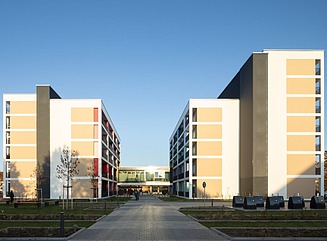 Building complex with three apartment blocks
