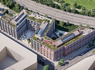 Hier sehen Sie ein Foto eines Bürogebäudes, eine ansprechende Rotklinker-Fassade und blauen Himmel