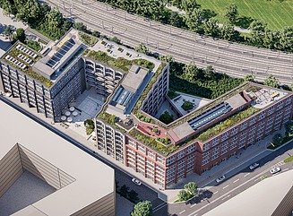 Hier sehen Sie ein Foto eines Bürogebäudes, eine ansprechende Rotklinker-Fassade und blauen Himmel