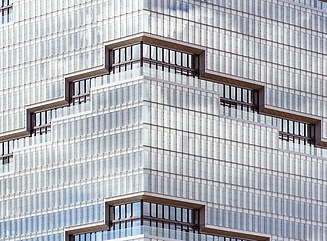 High-rise tower with stepped window design and stepped top floor