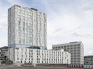 Construction site for a high-rise tower on a five-storey base building